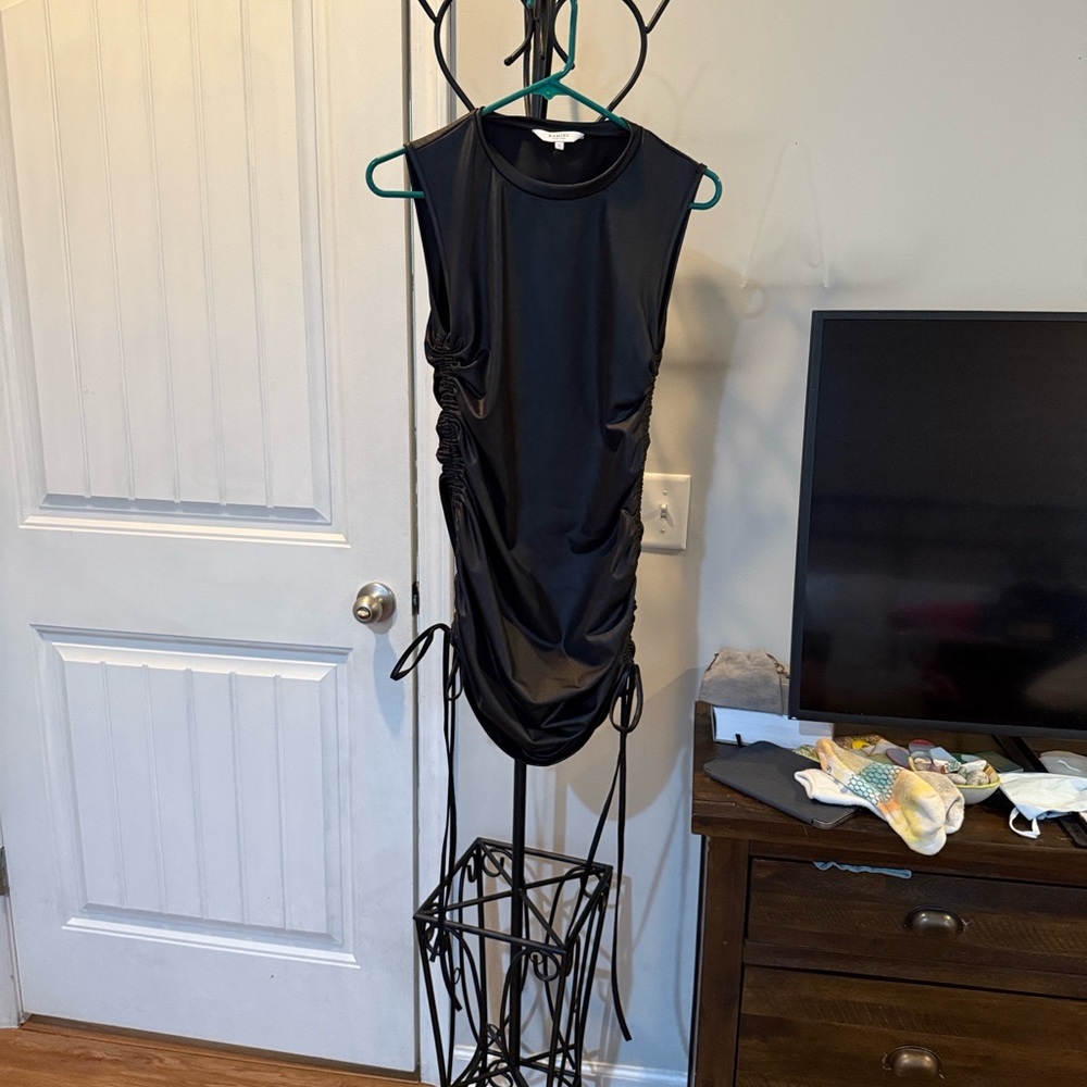 Ladies, faux leather Black Sleeveless dress, size Lg, Tightens/loosens on sides.